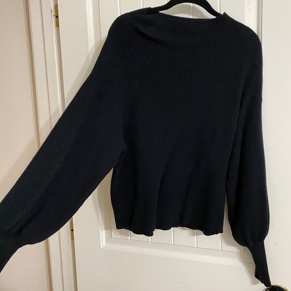 Black, cozy, boho sweater.  Bell sleeves.